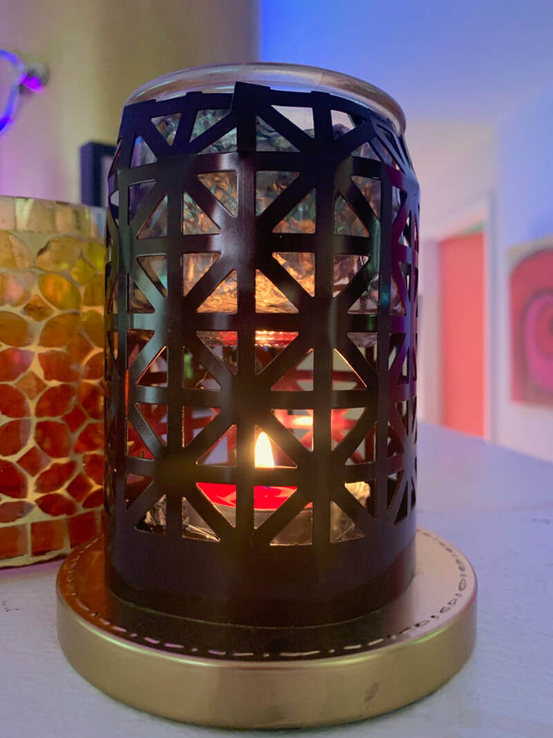 Voila! Just put wax in the jar, then set the cylinder over a lit tea light.